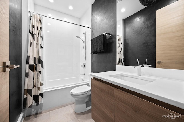 full bathroom featuring shower / tub combo with curtain, vanity, toilet, and tile patterned flooring