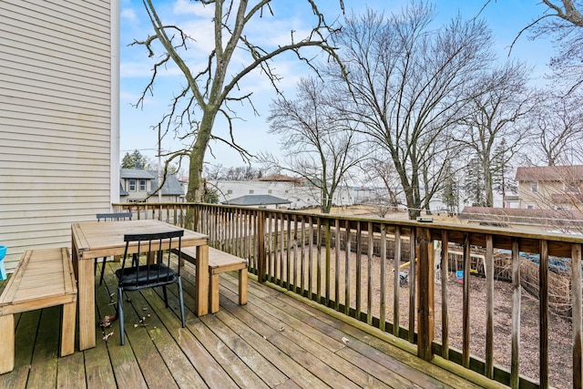 deck featuring outdoor dining area