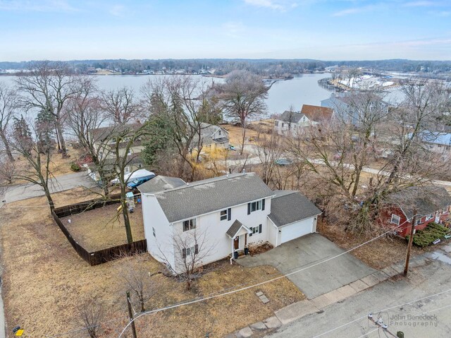 bird's eye view with a water view