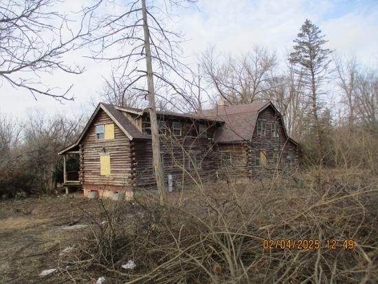 125 N Anderson Rd, New Lenox, IL 60451 - view of property exterior with log exterior and a gambrel roof