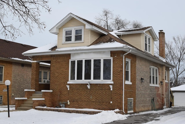 view of snow covered property