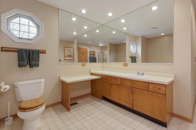 full bathroom featuring vanity, plus walk in shower, tile patterned floors, and toilet