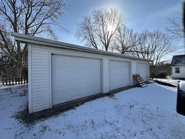 view of snow covered garage