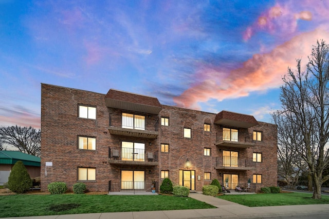 view of property at dusk