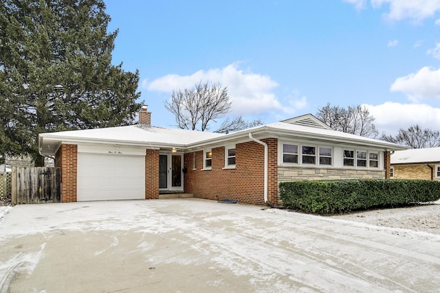 single story home featuring a garage