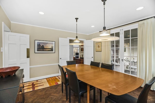 dining room featuring recessed lighting, crown molding, baseboards, and parquet flooring