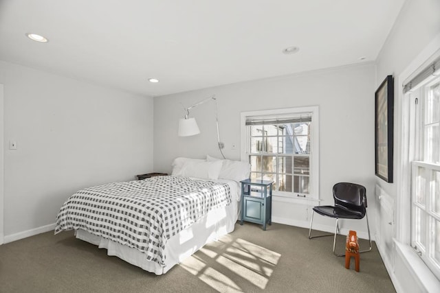 bedroom featuring baseboards, dark carpet, and recessed lighting