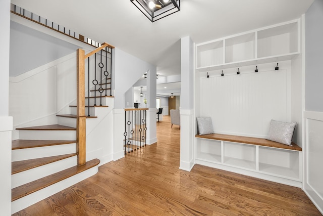 mudroom with wood-type flooring