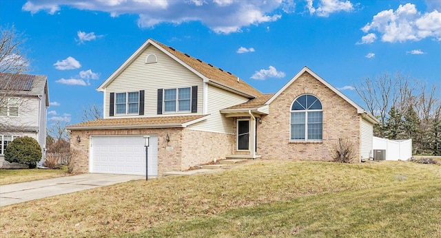 view of front of house with concrete driveway, brick siding, fence, and central air condition unit