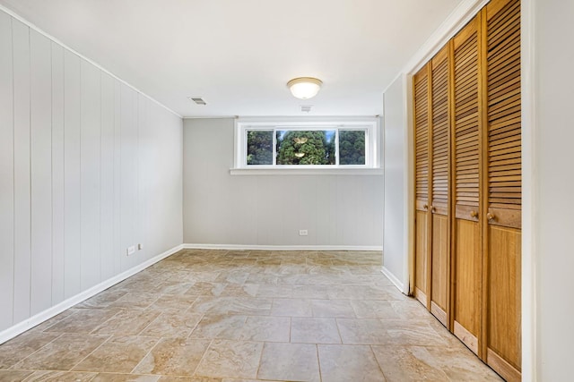 unfurnished bedroom with a closet