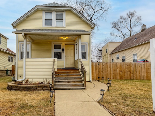 bungalow with a front lawn