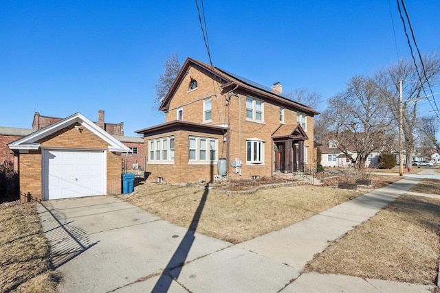 view of front of property featuring concrete driveway, brick siding, and a chimney