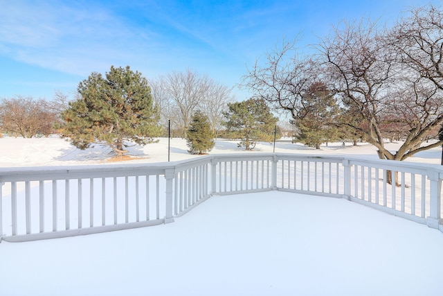 view of snow covered deck