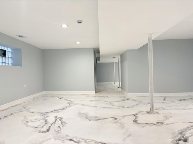 unfurnished room with marble finish floor, baseboards, visible vents, and recessed lighting