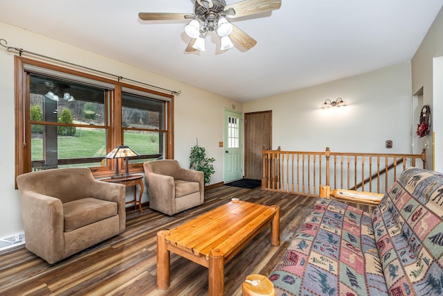 living room with hardwood / wood-style floors and ceiling fan