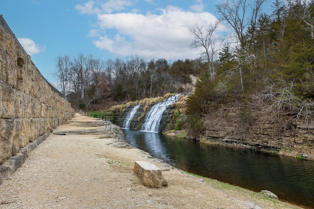 view of road featuring a water view