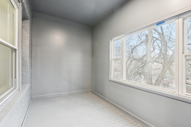 unfurnished room featuring light wood-type flooring