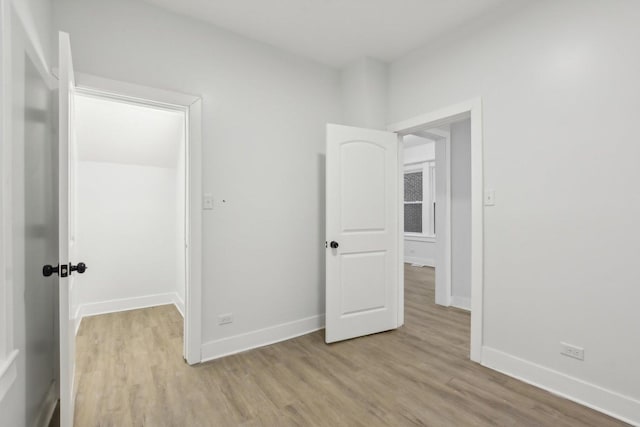 unfurnished bedroom featuring light hardwood / wood-style floors