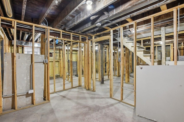 basement featuring white fridge