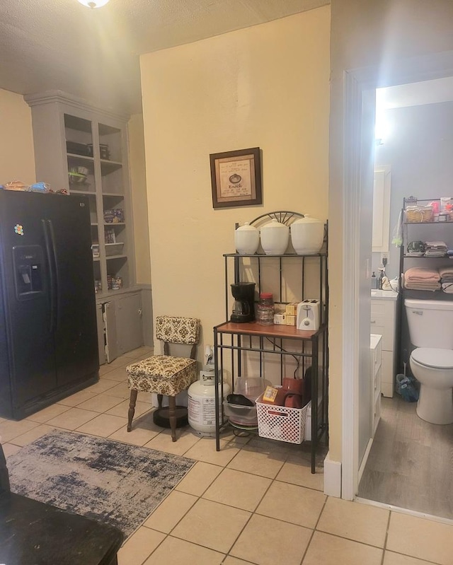 living area with light tile patterned floors