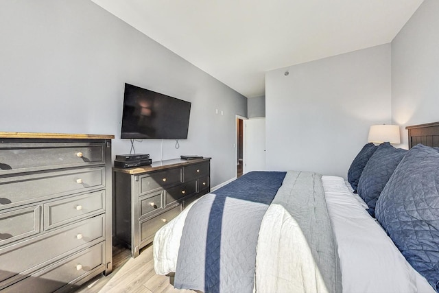 bedroom with light wood-type flooring