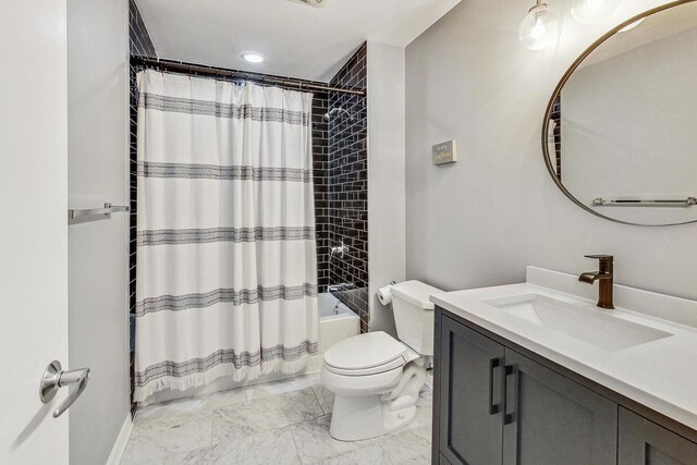 full bathroom featuring shower / tub combo with curtain, vanity, and toilet