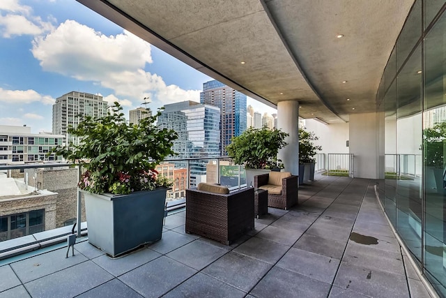 view of patio with a balcony