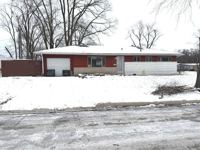 single story home with a garage