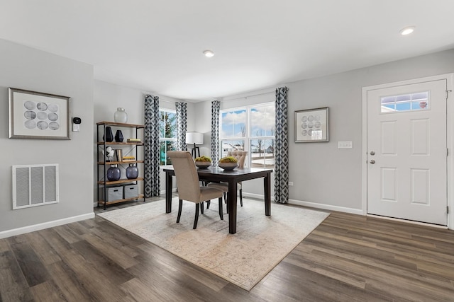 dining area featuring recessed lighting, dark wood finished floors, visible vents, and baseboards