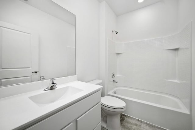 full bathroom with vanity, tub / shower combination, and toilet