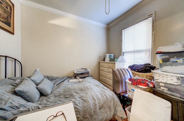 bedroom with ornamental molding