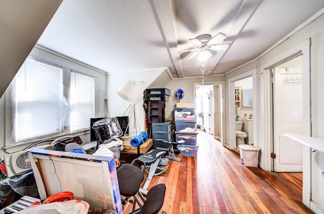 additional living space featuring wood-type flooring and ceiling fan