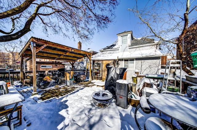 view of snow covered house