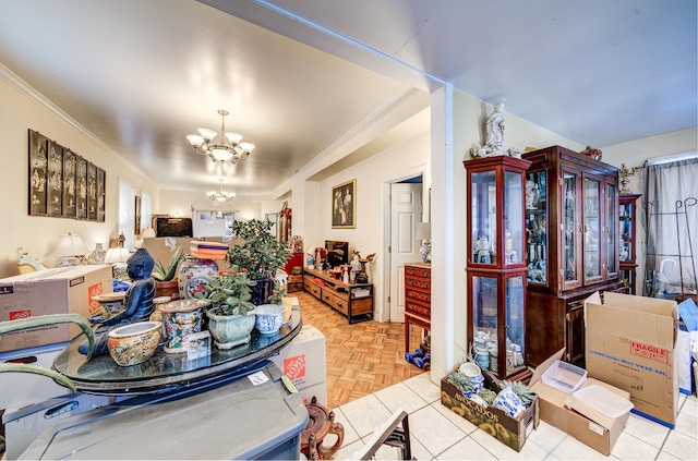 dining room with a notable chandelier, crown molding, and light parquet floors