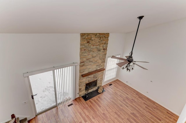 living room featuring light hardwood / wood-style floors and a fireplace