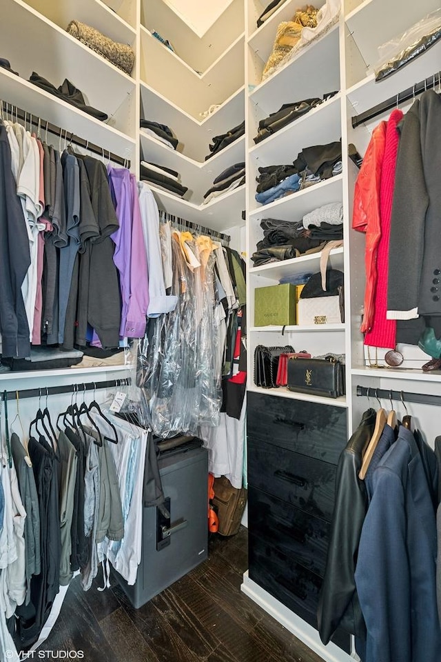 walk in closet featuring hardwood / wood-style floors