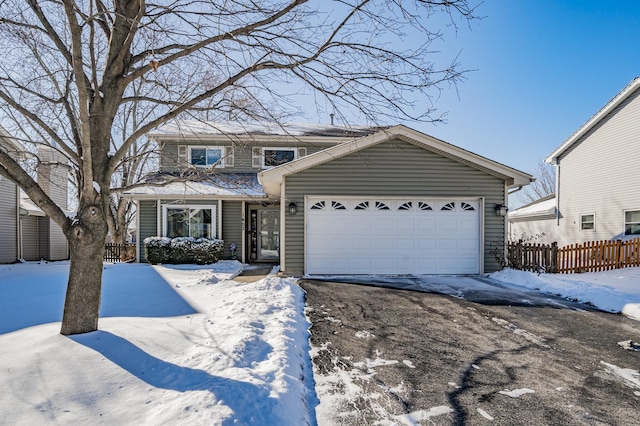 view of front of home with a garage