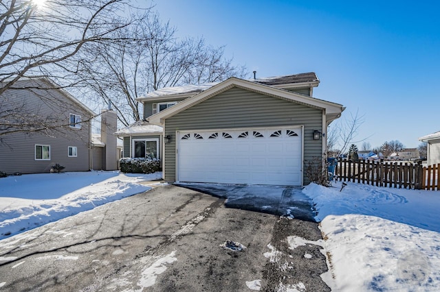 view of front of property featuring a garage