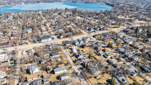 bird's eye view with a residential view and a water view