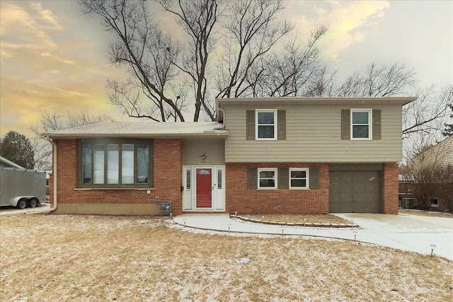 split level home with a garage