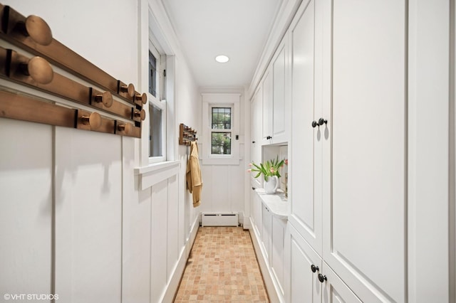 entryway featuring recessed lighting and a baseboard heating unit