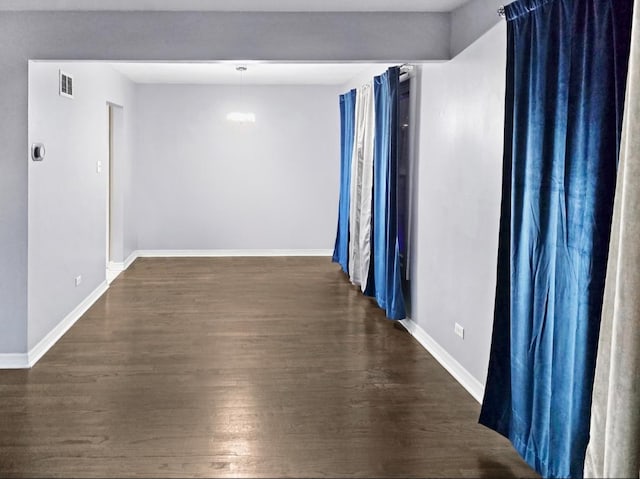 hall featuring dark hardwood / wood-style flooring