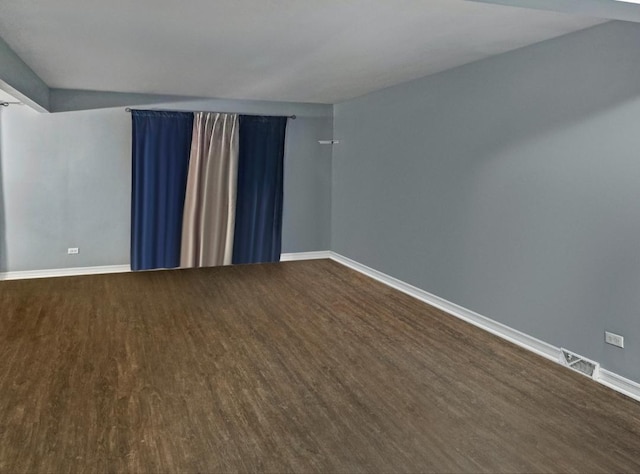 empty room featuring hardwood / wood-style flooring