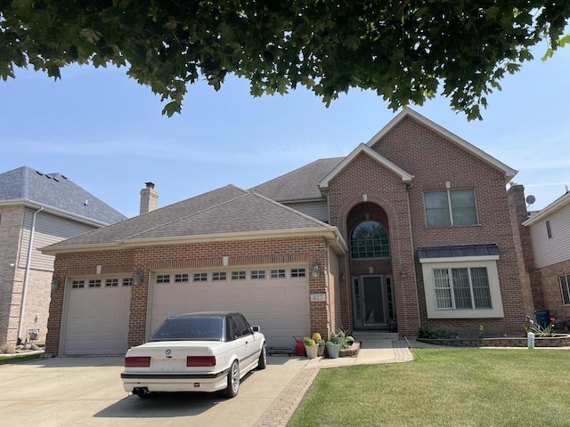 427 W Natoma Ave, Addison, IL 60101 - traditional-style home featuring brick siding, a garage, concrete driveway, a front lawn, and a chimney