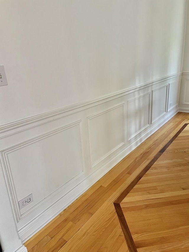 427 W Natoma Ave, Addison, IL 60101 - detailed view of a decorative wall, wainscoting, and wood finished floors