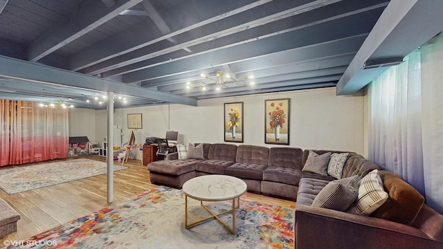 living room featuring hardwood / wood-style floors and beam ceiling