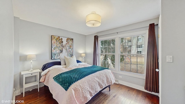 bedroom featuring dark wood-type flooring