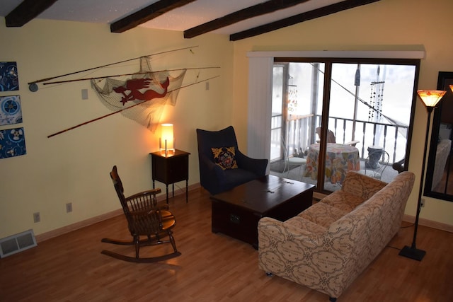 1407 Country Club Ln, Loda, IL 60948 - living area with visible vents, baseboards, wood finished floors, and lofted ceiling with beams