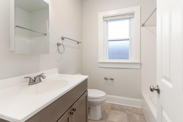 bathroom with toilet and vanity