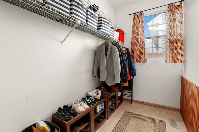 spacious closet featuring visible vents